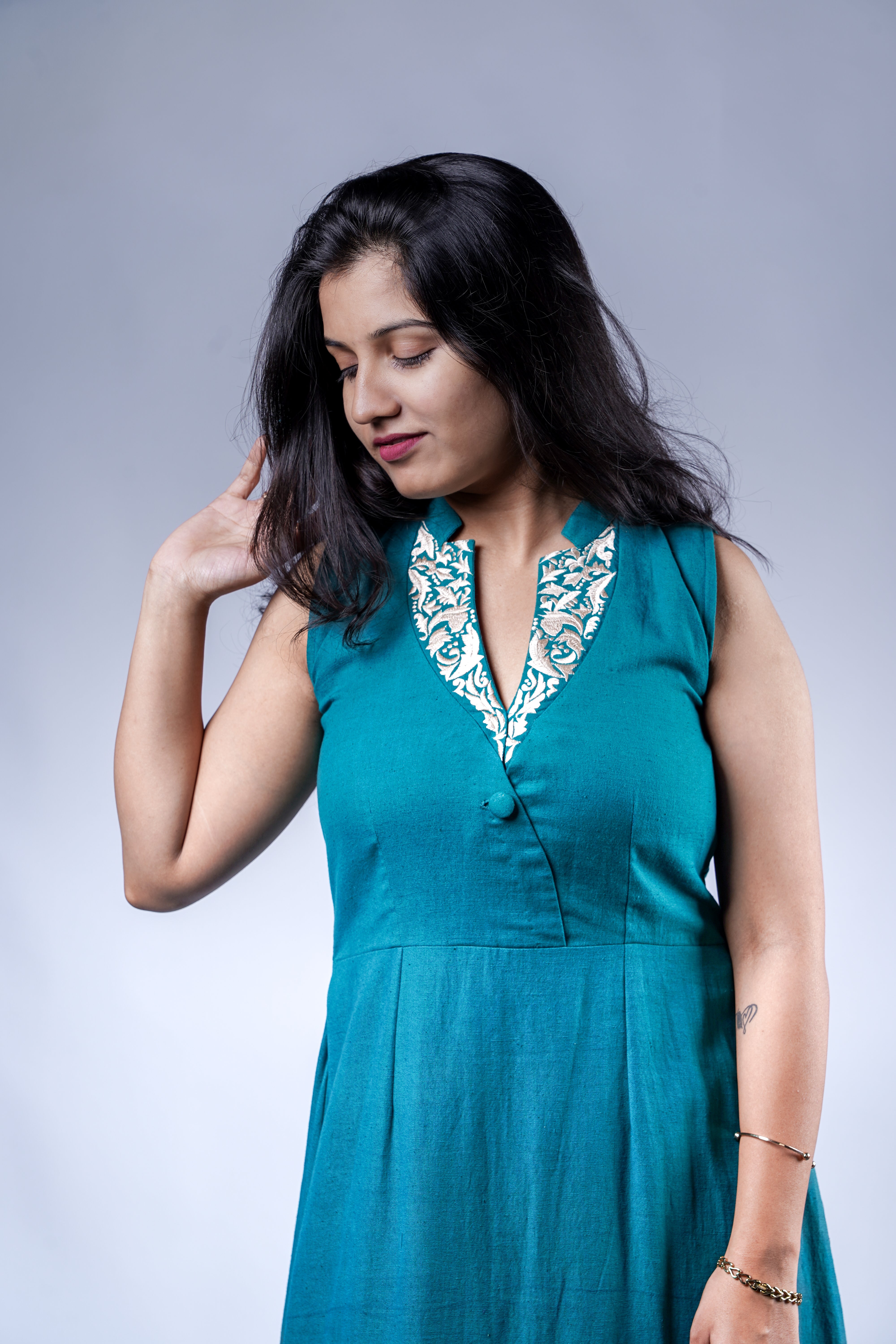 Trevae’s  Rama Green  Asymmetrical  Pleated  Dress