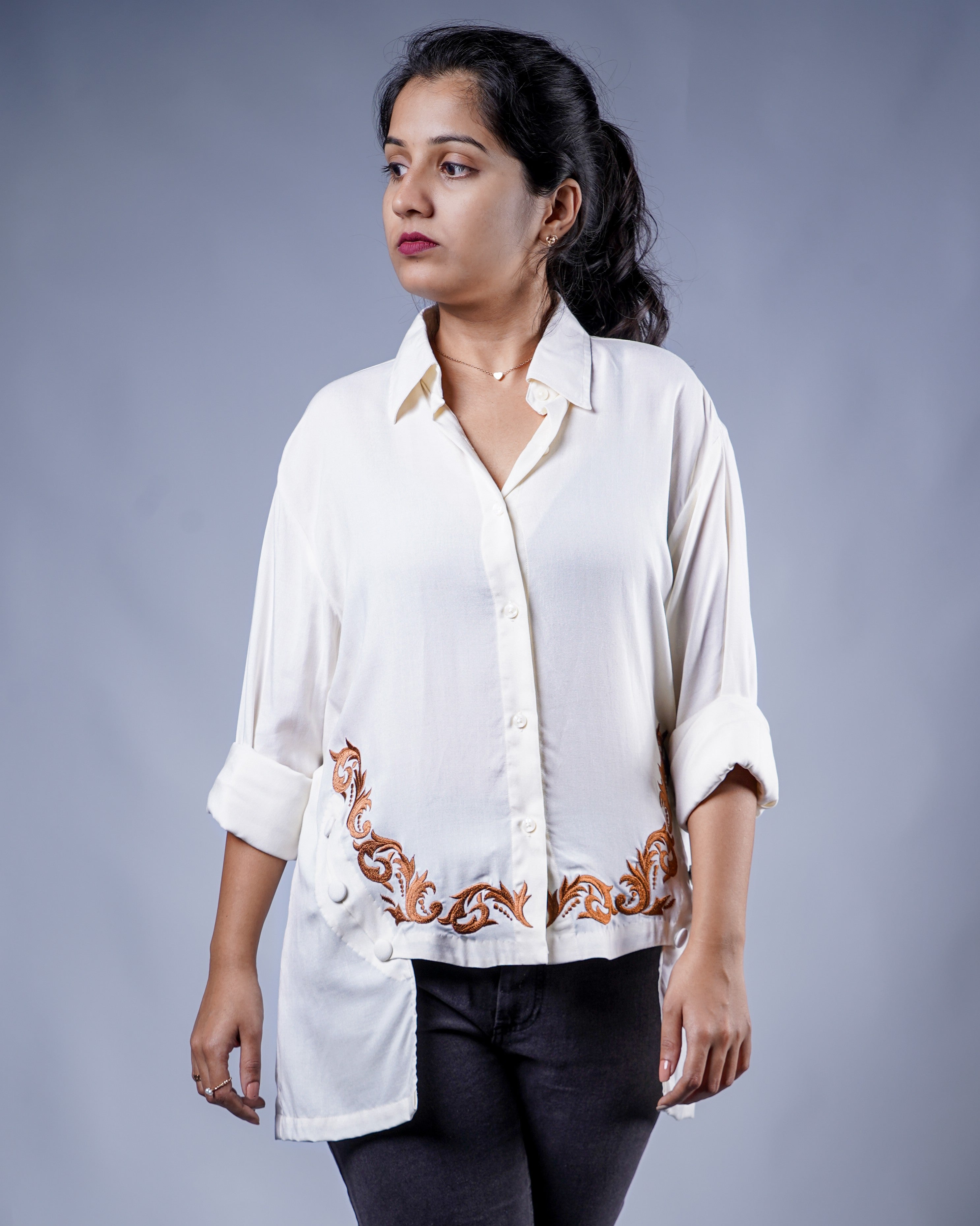 Trevae’s  Ivory  Rayon  High-Low  Shirt with  Curved  Embroidered Hem