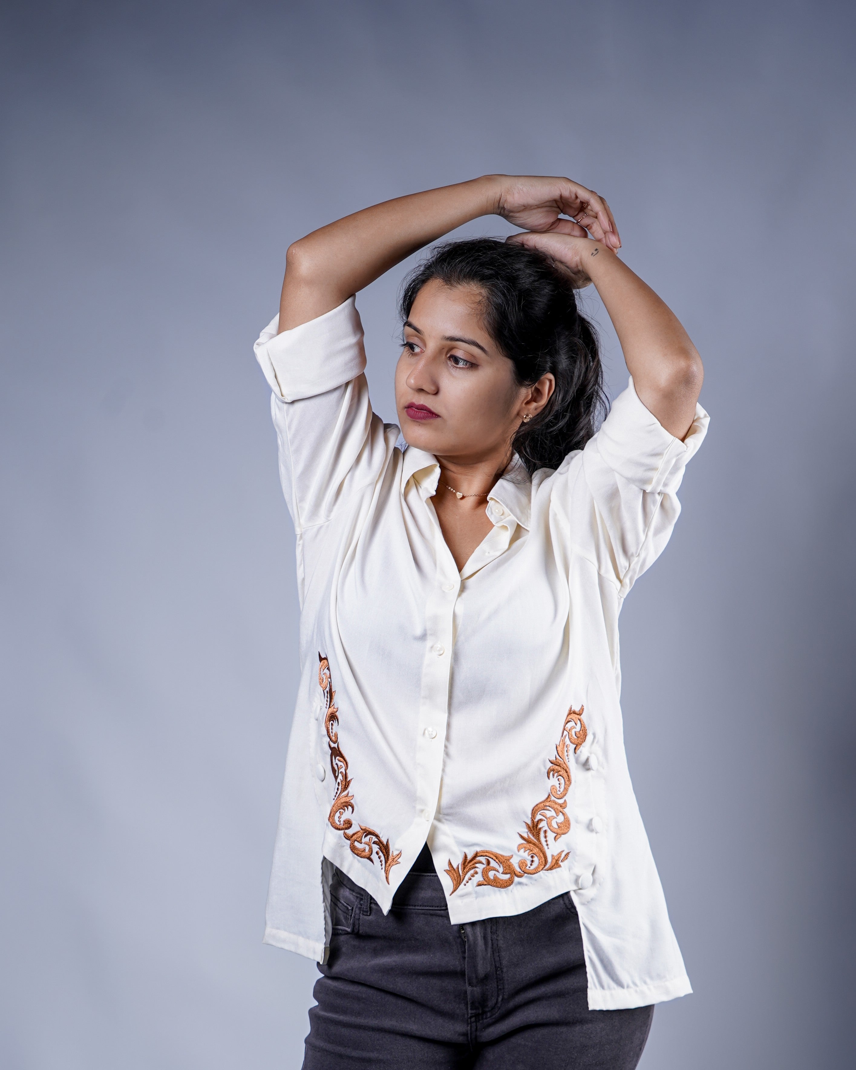 Trevae’s  Ivory  Rayon  High-Low  Shirt with  Curved  Embroidered Hem